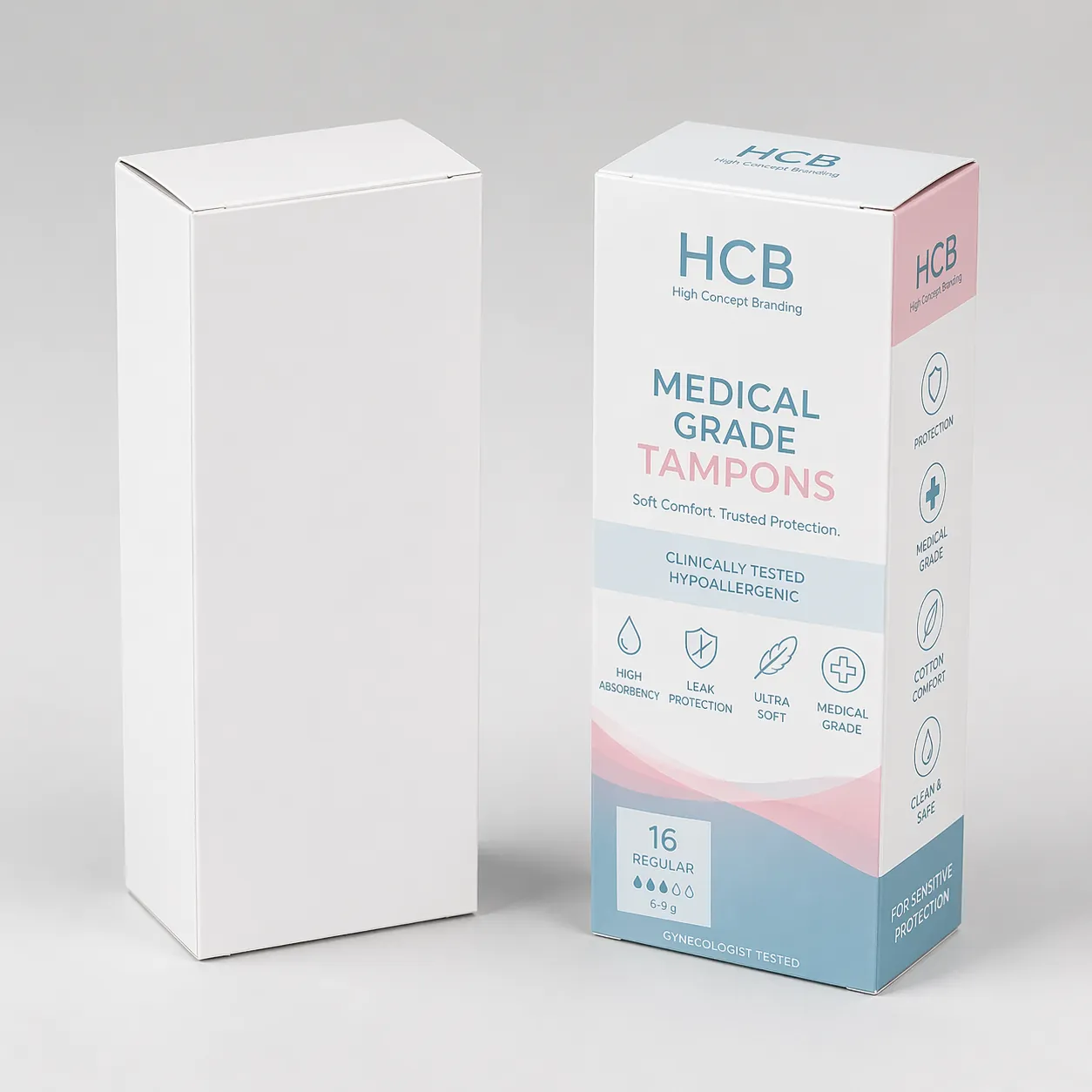 Two rectangular boxes, one blank white and one with elegant teal floral patterns and logos. class=